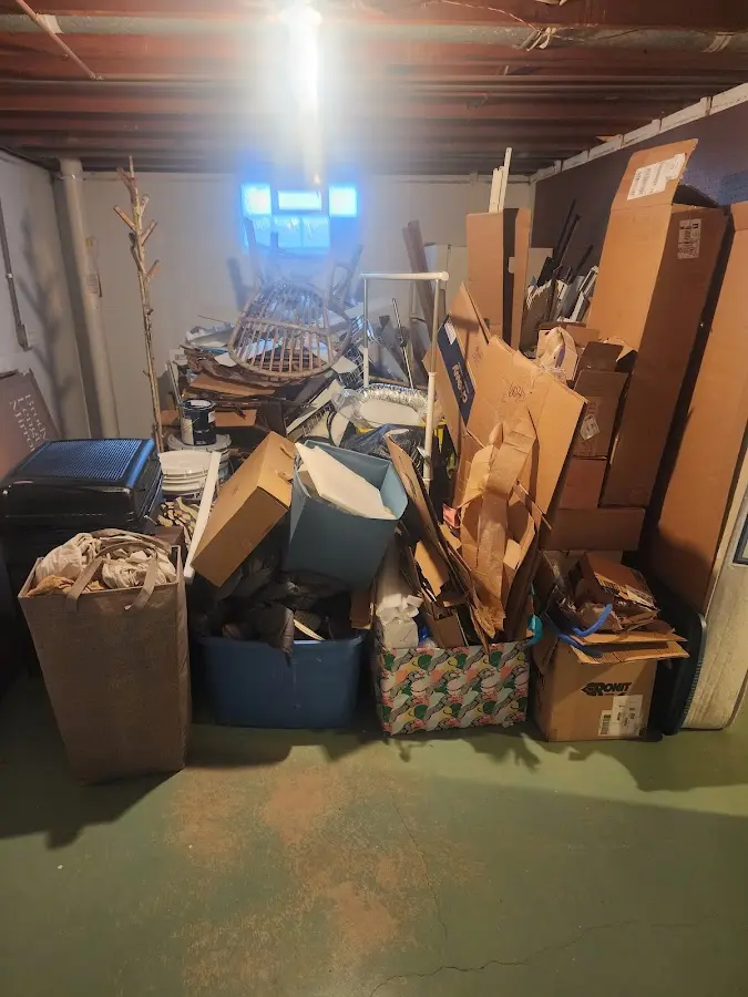 Roll-off dumpster container at job site for Yard Waste Dumpster Rental in Rose